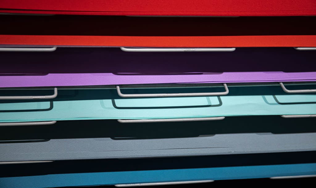 Colored Papers on Steel Shelves