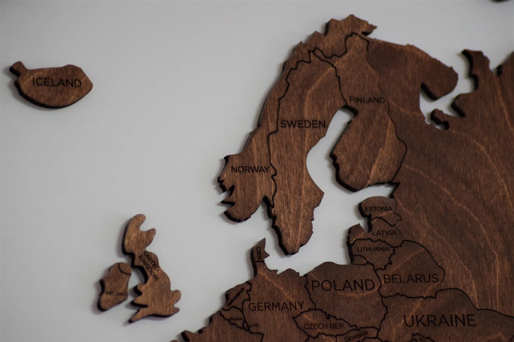 Intricate wooden map featuring Northern Europe and surrounding regions.